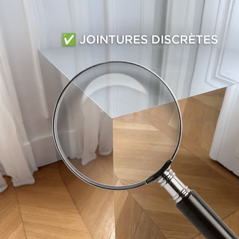 Zoom sur les jointures discrètes du mobilier miroir